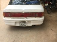 Mazda 323 1994 - Cần bán Mazda 323 đời 1994, màu trắng giá 60 triệu tại Hà Giang