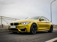 BMW M4 2016 - Cần bán lại xe BMW M4 sản xuất 2016, màu vàng, xe nhập giá 3 tỷ 350 tr tại Tp.HCM