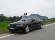 BMW 3 Series 320i 1997 - Bán xe BMW 3 Series 320i năm 1997, màu đen, xe nhập  giá 60 triệu tại Thanh Hóa