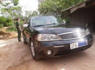 Ford Laser 2004 - Cần bán lại xe Ford Laser sản xuất 2004, màu đen chính chủ, 245 triệu giá 245 triệu tại Nghệ An