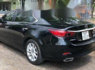 Mazda MX 6 2015 - Bán Mazda MX 6 năm sản xuất 2015, màu đen còn mới, giá tốt giá 720 triệu tại Tp.HCM