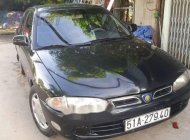 Mitsubishi Proton 1997 - Cần bán lại xe Mitsubishi Proton đời 1997, màu đen giá 87 triệu tại Tp.HCM
