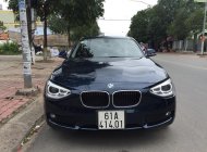 BMW 1 Series 116i 2014 - Cần bán BMW 1 Series 116i sản xuất 2014, màu xanh lam, xe nhập giá 885 triệu tại Bình Dương