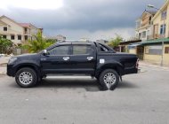 Toyota Hilux G  2012 - Bán xe Toyota Hilux G năm sản xuất 2012, màu đen, giá tốt giá 455 triệu tại Nghệ An