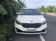 Kia Sedona GAT 2015 - Bán Kia Sedona 2015 màu trắng, số tự động, bản nhập Hàn Quốc giá 990 triệu tại Tp.HCM