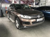 Volkswagen Touareg 2013 - Tôi bán chiếc Volkswagen Touareg 3.6 V6 5 chỗ, số tự động, sản xuất năm 2013, chạy 71000km, màu nâu giá 1 tỷ 420 tr tại Tp.HCM