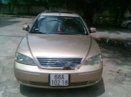 Ford Mondeo 2004 - Cần bán lại xe Ford Mondeo năm 2004, màu vàng, giá rẻ giá 180 triệu tại Kiên Giang