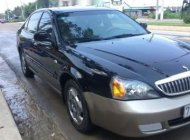 Daewoo Magnus   2004 - Bán Daewoo Magnus đời 2004, màu đen giá 155 triệu tại Khánh Hòa