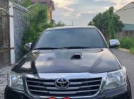 Toyota Hilux   E 2013 - Cần bán lại xe Toyota Hilux E đời 2013, màu đen giá 480 triệu tại Tp.HCM