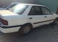 Mazda 323   1988 - Bán ô tô Mazda 323 1988, màu trắng, xe đẹp giá 52 triệu tại Bình Dương