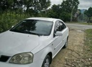 Daewoo Lacetti  SE  2004 - Gia đình bán Daewoo Lacetti SE năm 2004, màu trắng giá 136 triệu tại Đồng Nai