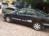 Mazda 626   2005 - Cần bán Mazda 626 đời 2005, màu đen, xe gia đình, giá chỉ 175 triệu giá 175 triệu tại Hà Nội