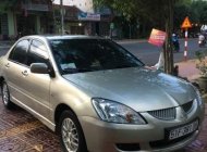 Mitsubishi Lancer 2004 - Bán Mitsubishi Lancer sản xuất năm 2004, màu ghi vàng giá 240 triệu tại Gia Lai