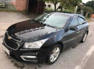 Chevrolet Cruze LT 1.6 MT 2015 - Cần bán lại xe Chevrolet Cruze LT 1.6 MT sản xuất 2015, màu đen số sàn giá 395 triệu tại Hà Nam