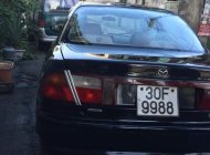 Mazda 323 2001 - Cần bán xe Mazda 323 g sản xuất năm 2001, màu đen, xe nhập giá 120 triệu tại Hà Nam