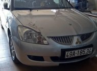 Mitsubishi Lancer 2004 - Cần bán xe cũ Mitsubishi Lancer năm sản xuất 2004, màu bạc xe gia đình giá 225 triệu tại Lâm Đồng