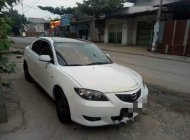 Mazda 3 2004 - Cần bán lại xe Mazda 3 2004, màu trắng, nhập khẩu nguyên chiếc  giá 245 triệu tại Đồng Tháp