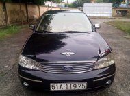 Ford Laser GHIA 2004 - Bán Ford Laser GHIA 2004, màu đen chính chủ, giá 242tr giá 242 triệu tại Tp.HCM