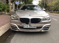 BMW 7 Series  750Li 2010 - Bán BMW 7 Series 750Li năm sản xuất 2010, màu ghi vàng giá 1 tỷ 200 tr tại Tp.HCM