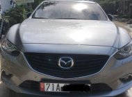 Mazda 6 2.0AT 2016 - Cần bán xe Mazda 6 2.0AT đời 2016, màu bạc xe gia đình giá 720 triệu tại Bến Tre