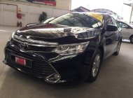 Toyota Camry E 2015 - Bán Toyota Camry E 2015, màu đen, mới đi 34.000km, xe đẹp, giá thương lượng giá 910 triệu tại Tp.HCM