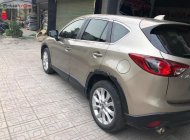 Mazda CX 5 2.0AT 2014 - Bán Mazda CX 5 2.0AT năm sản xuất 2014, màu vàng cát giá 735 triệu tại Thái Nguyên