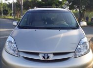 Toyota Sienna LE 2007 - Cần bán lại xe Toyota Sienna LE năm sản xuất 2007, màu vàng, xe nhập còn mới giá 666 triệu tại Tp.HCM