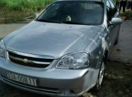 Chevrolet Lacetti 1.6  2011 - Cần bán xe Chevrolet Lacetti 1.6 đời 2011, màu bạc số sàn giá 235 triệu tại Bình Phước