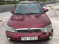 Ford Laser Ghia 2003 - Bán xe Ford Laser Ghia sản xuất 2003, màu đỏ, giá chỉ 225 triệu giá 225 triệu tại Tây Ninh