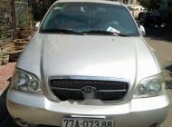 Kia Carnival  GS 2.5 MT    2008 - Cần bán xe Kia Carnival GS 2.5 MT đời 2008, màu bạc chính chủ giá 240 triệu tại Bình Định