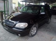 Kia Carnival 2006 - Cần bán Kia Carnival đời 2006, màu đen, xe nhập chính chủ, giá chỉ 245 triệu giá 245 triệu tại Bình Định