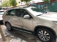 Kia Sorento AT 2014 - Bán Kia Sorento 2014 số AT dẫn động 2WD, chạy dầu 6.1lít/100km, màu nâu, nội thất đen giá 699 triệu tại Hà Nội