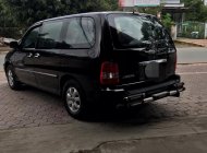 Kia Carnival GS 2006 - Cần bán xe Kia Carnival năm 2006 màu đen, giá chỉ 220 triệu, nhập khẩu giá 220 triệu tại Quảng Ngãi