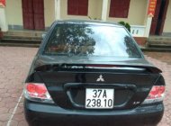Mitsubishi Lancer Gala GLX 1.6AT 2003 - Bán ô tô Mitsubishi Lancer Gala GLX 1.6AT 2003, màu đen   giá 200 triệu tại Nghệ An