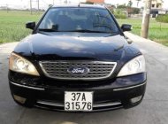 Ford Mondeo 2004 - Cần bán Ford Mondeo đời 2005, màu đen số tự động giá 155 triệu tại Nghệ An