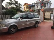 Kia Carnival 2007 - Cần bán Kia Carnival đời 2007, màu bạc số sàn giá 210 triệu tại Hải Dương