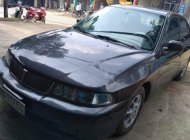 Mitsubishi Lancer GLXI 1.6 MT 2003 - Cần bán xe Mitsubishi Lancer GLXI 1.6 MT năm sản xuất 2003, màu đen xe gia đình, giá chỉ 135 triệu giá 135 triệu tại Sơn La