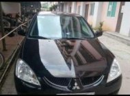 Mitsubishi Lancer 2004 - Bán xe Mitsubishi Lancer 2004, màu đen xe gia đình, 232 triệu giá 232 triệu tại Nghệ An