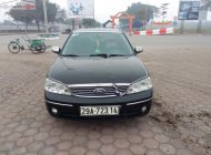 Ford Laser Ghia 2004 - Bán Ford Laser Ghia 2004, màu đen như mới, giá tốt giá 160 triệu tại Hà Nội