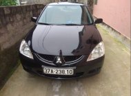 Mitsubishi Lancer 2003 - Cần bán gấp Mitsubishi Lancer năm 2003, màu đen, nhập khẩu nguyên chiếc, 190tr giá 190 triệu tại Nghệ An