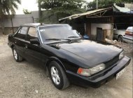 Mazda 626 1986 - Cần bán gấp Mazda 626 đời 1986, màu đen, xe nhập còn mới giá 35 triệu tại Tp.HCM