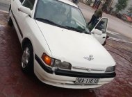 Mazda 323 1.6 MT 1995 - Cần bán Mazda 323 1.6 MT 1995, màu trắng giá 45 triệu tại Hòa Bình