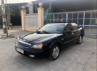 Daewoo Magnus 2005 - Bán Daewoo Magnus năm 2005, màu đen xe gia đình giá 170 triệu tại Tây Ninh