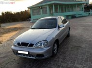 Daewoo Lanos SX 2001 - Cần bán lại xe Daewoo Lanos SX đời 2001, màu bạc giá 90 triệu tại Bình Dương