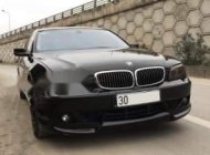 BMW 7 Series  750Li  2005 - Bán ô tô BMW 7 Series 750Li sản xuất năm 2005, màu đen số tự động giá 650 triệu tại Hà Nội