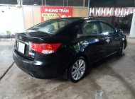 Kia Forte 2010 - Bán Kia Forte đời 2010, màu đen số sàn giá 233 triệu tại Sơn La