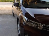 Toyota Corolla altis 1.8G MT 2015 - Bán Toyota Corolla altis 1.8G MT đời 2015, màu nâu, đẹp như mới giá 580 triệu tại Vĩnh Phúc