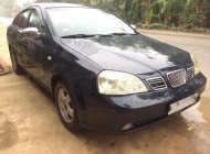 Daewoo Lacetti Ex 2004 - Cần bán gấp Daewoo Lacetti Ex đời 2004, màu xanh lục, 128 triệu giá 128 triệu tại Thanh Hóa