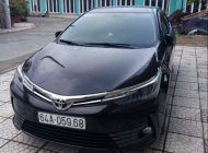 Toyota Corolla altis  2.0 V  2017 - Bán Toyota Corolla altis năm 2017, màu nâu chính chủ, giá chỉ 860 triệu giá 860 triệu tại Vĩnh Long