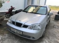 Daewoo Lacetti EX 1.6 MT 2005 - Bán xe Daewoo Lacetti EX Sx 2005, số tay, máy xăng, màu bạc, nội thất màu xám, odo 80000 km giá 165 triệu tại Long An